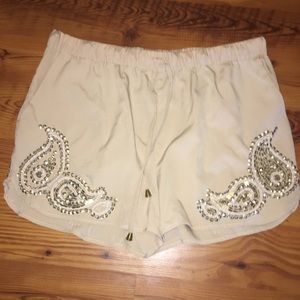 Satin drawstring shorts with embellishments